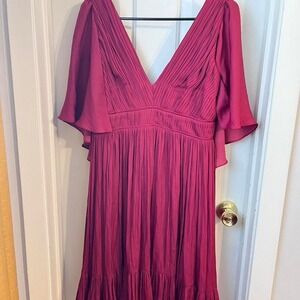 Burgundy mini dress with ruffles and V-neck